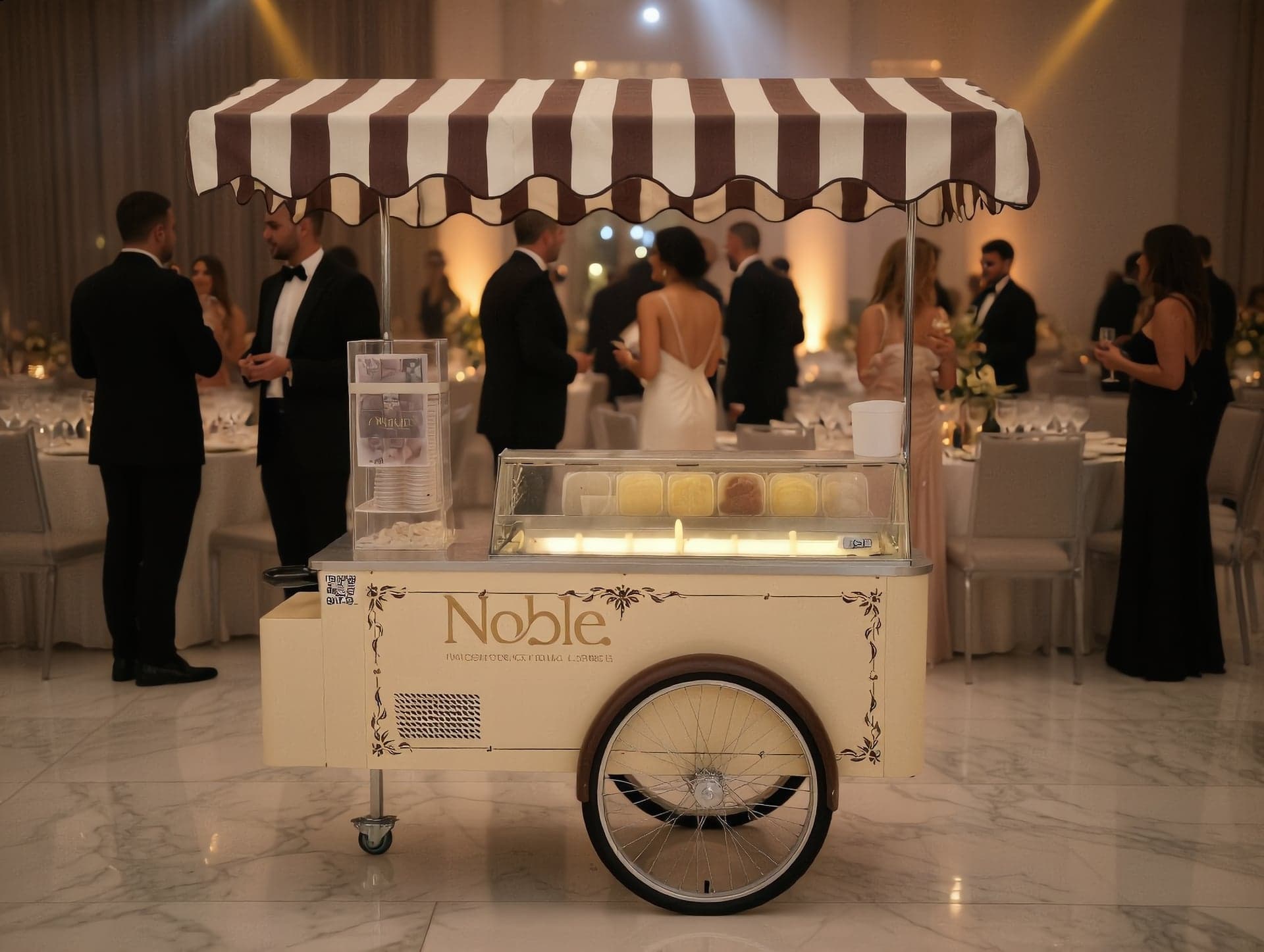 Noble gelato cart with striped canopy at an elegant black-tie reception